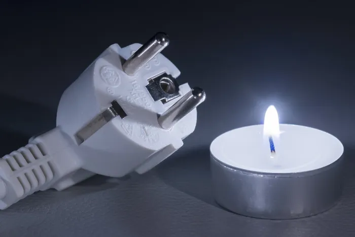 Framed Print : Glowing Candle Next to Electrical Plug Print Framed Print : Glowing Candle Next to Electrical Plug Print