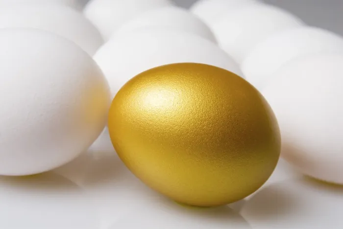 Framed Print : Golden Easter Egg Between White Eggs Print