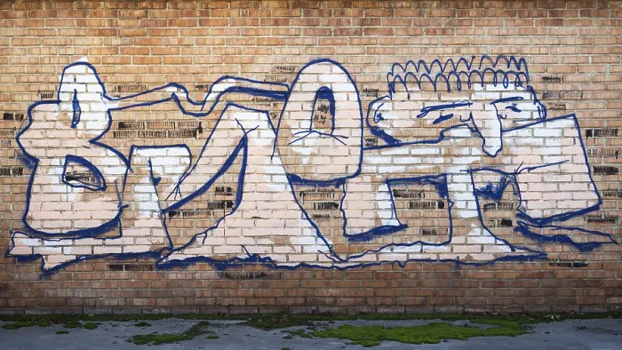 Framed Print : Graffiti Print on Brick Wall Framed Print : Graffiti Print on Brick Wall