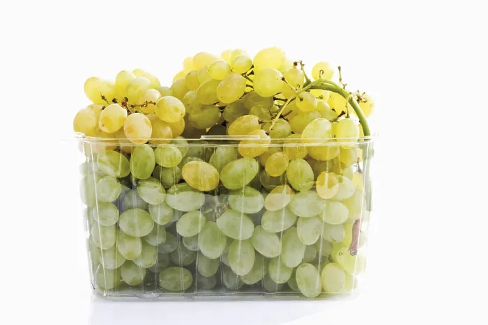 Framed Print : Green Grapes in Plastic Packaging Print