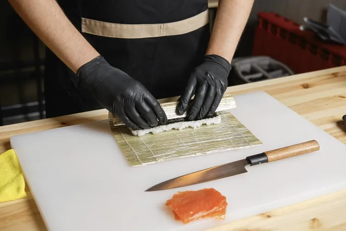 Framed Print : Hands of Chef Making Salmon Rolls Print Framed Print : Hands of Chef Making Salmon Rolls Print