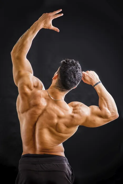 Framed Print : Handsome Bodybuilder Double Biceps Print