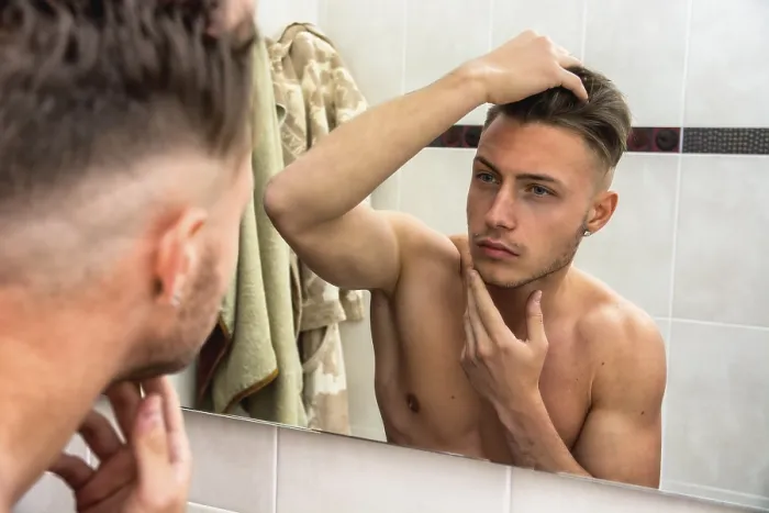 Framed Print : Handsome Man Checking His Hair in Mirror Print Framed Print : Handsome Man Checking His Hair in Mirror Print