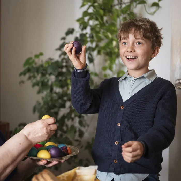 Framed Print : Happy Boy Holding a Broken Easter Egg Print Framed Print : Happy Boy Holding a Broken Easter Egg Print