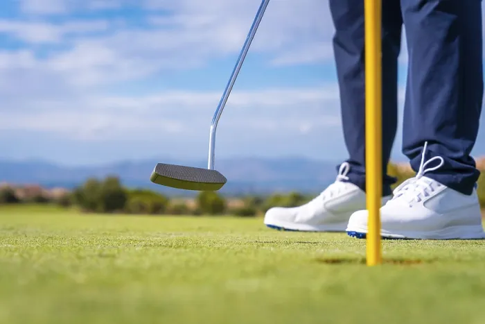 Framed Print : Golf Print: Man Hitting the Green with Putter Framed Print : Golf Print: Man Hitting the Green with Putter
