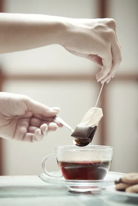 Framed Print : Human Hands Making Tea Print Framed Print : Human Hands Making Tea Print