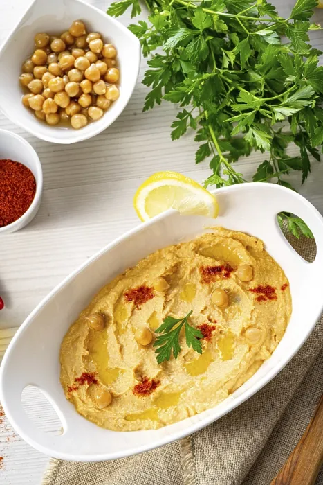 Framed Print : Hummus Paste Print with Lemon and Chilli on White Background Framed Print : Hummus Paste Print with Lemon and Chilli on White Background