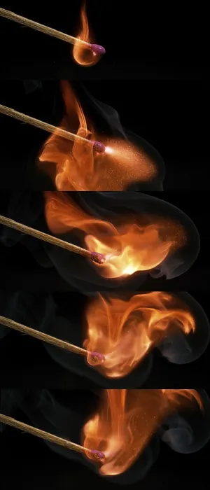 Framed Print : Igniting Matches Print against Black Background