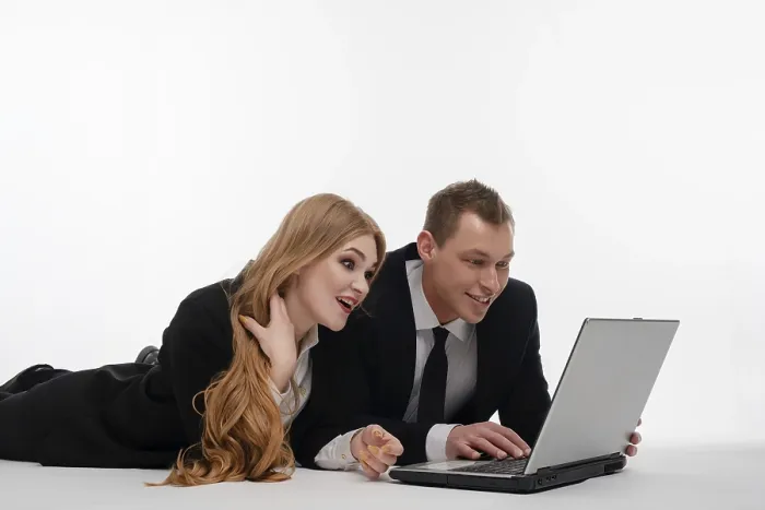 Framed Print : Collaborative Work Print: Two Individuals on a Laptop