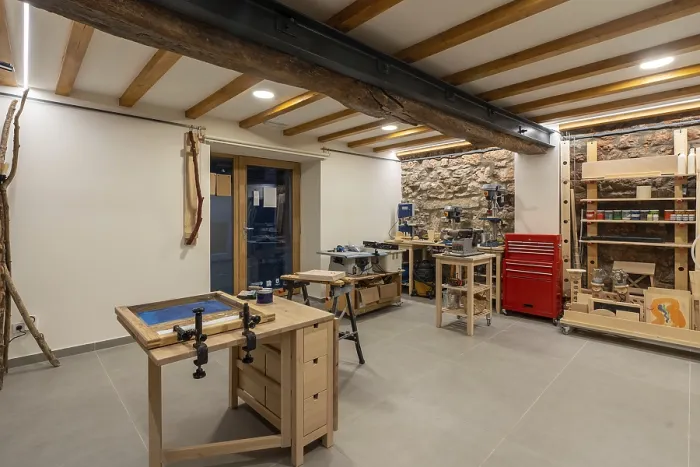 Framed Print : Interior of a Screen Printing Studio with Print Tables Framed Print : Interior of a Screen Printing Studio with Print Tables