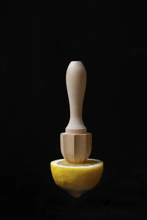 Framed Print : Lemon and Lemon Squeezer Print Against Black Background Framed Print : Lemon and Lemon Squeezer Print Against Black Background