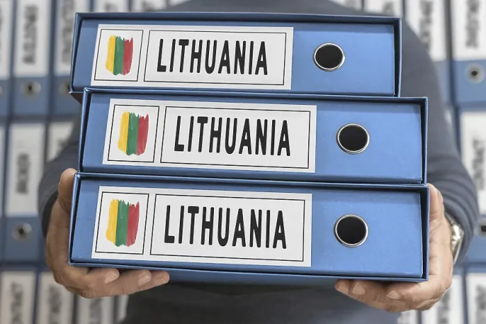 Framed Print : Lithuania Administrative Files Print - Hands Holding Folders Framed Print : Lithuania Administrative Files Print - Hands Holding Folders