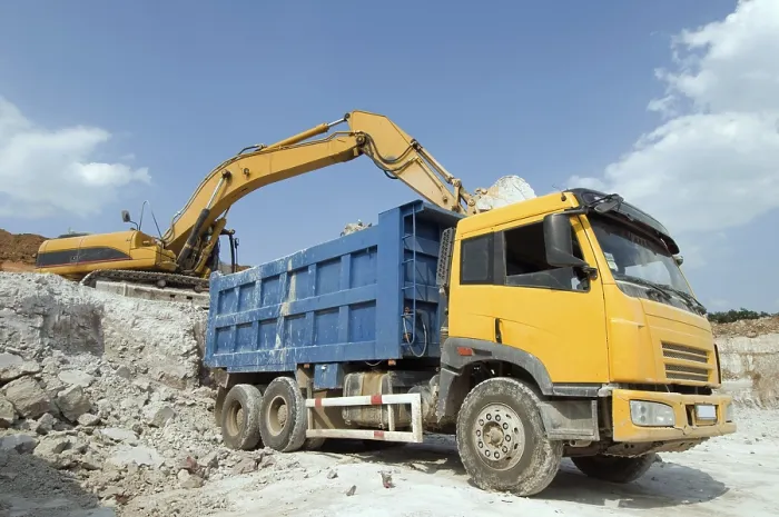Framed Print : Loading a Large Lorry with Building Materials Print Framed Print : Loading a Large Lorry with Building Materials Print