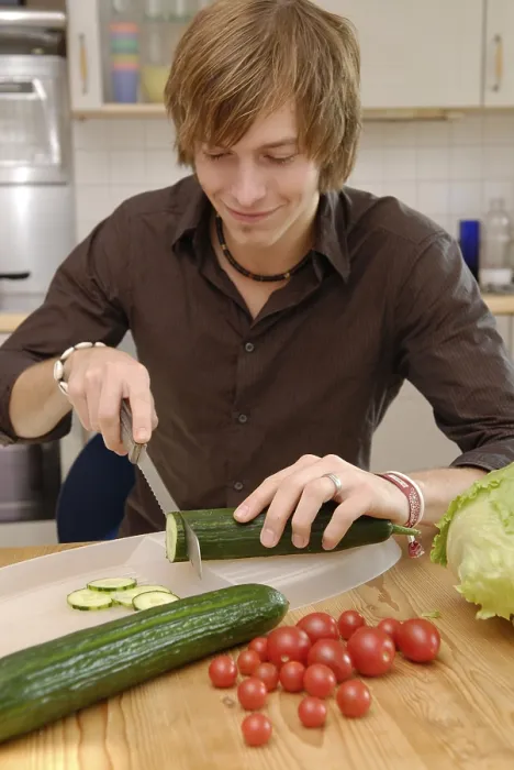 Framed Print : Man Cuts Cucumbers Print Framed Print : Man Cuts Cucumbers Print