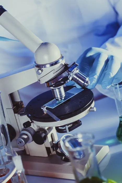 Framed Print : Scientist Examining Microscope Print Framed Print : Scientist Examining Microscope Print