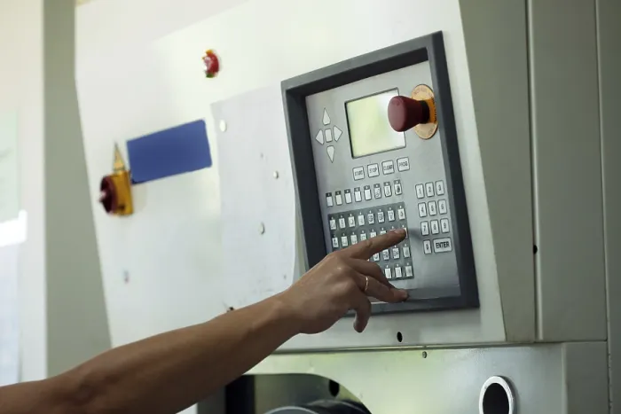 Framed Print : Man Presses Button Print, Close-up Electronic Control Panel Framed Print : Man Presses Button Print, Close-up Electronic Control Panel