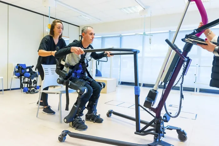Framed Print : Print of Mechanical Exoskeleton in Rehabilitation Setting