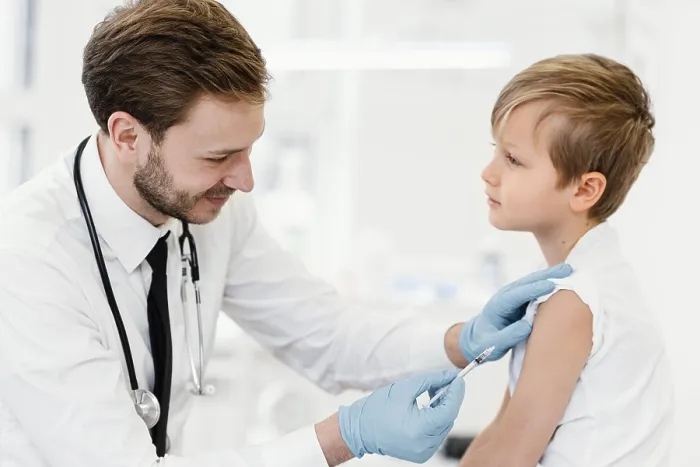 Framed Print : Medium Shot Print of a Child Getting Vaccinated Framed Print : Medium Shot Print of a Child Getting Vaccinated