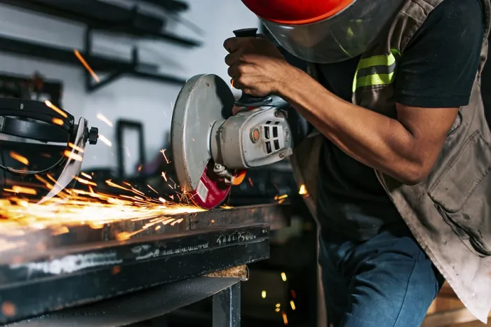 Framed Print : Metalworking Professional Using an Angle Grinder Print Framed Print : Metalworking Professional Using an Angle Grinder Print