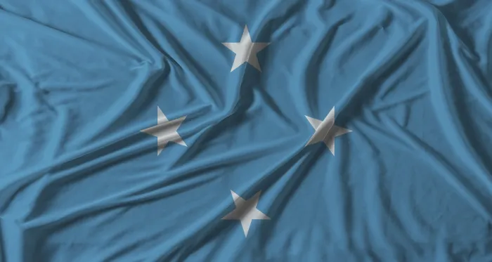 Framed Print : Micronesia Flag Print with Fabric Texture Background Framed Print : Micronesia Flag Print with Fabric Texture Background