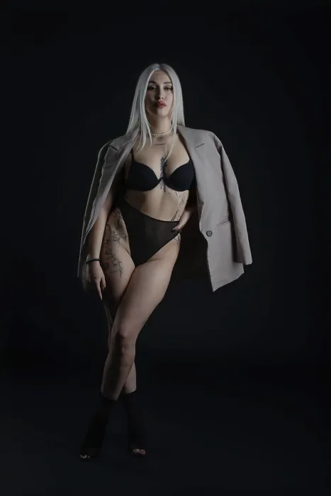 Framed Print : Confident Model in Dark Studio Print Framed Print : Confident Model in Dark Studio Print
