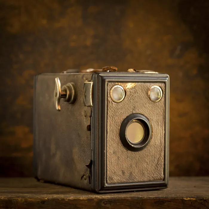 Framed Print : Old Camera Print on Brown Background Framed Print : Old Camera Print on Brown Background