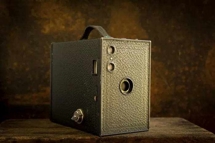 Framed Print : Old Camera Print on Brown Background Framed Print : Old Camera Print on Brown Background