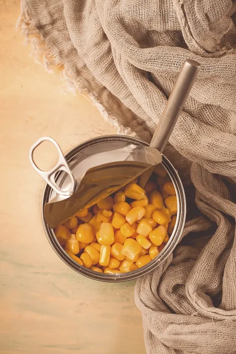 Framed Print : Open Tin Can with Corn Print, Top View Framed Print : Open Tin Can with Corn Print, Top View