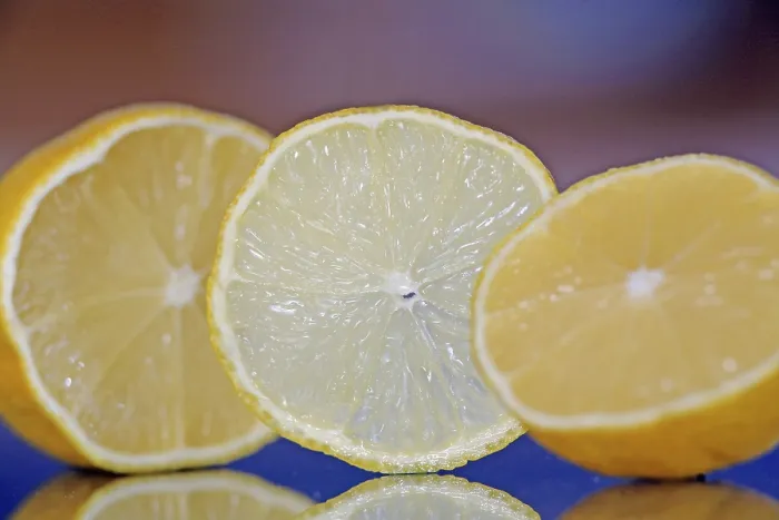 Framed Print : A Orange Slice Between Two Half Oranges Print