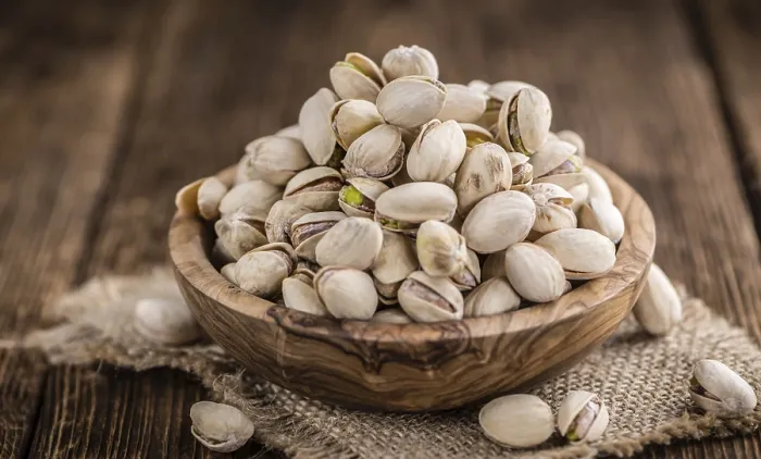 Framed Print : Whole Pistachios Print on Wooden Background Framed Print : Whole Pistachios Print on Wooden Background