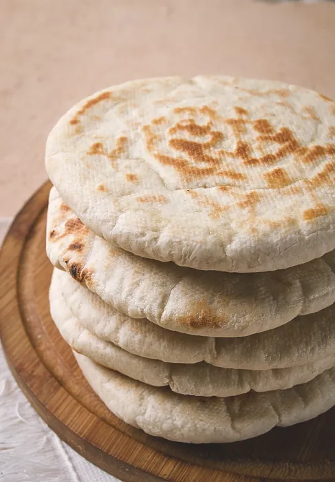 Framed Print : Pita Bread Stack Print on Table Framed Print : Pita Bread Stack Print on Table