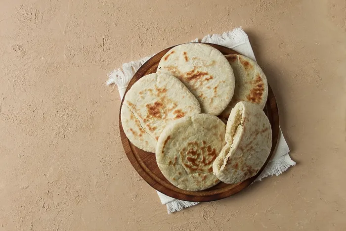 Framed Print : Pita Bread Print: Stack on Table Framed Print : Pita Bread Print: Stack on Table