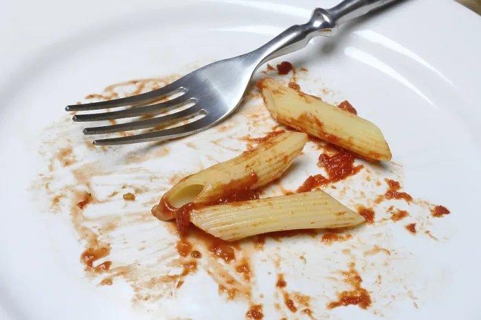 Framed Print : Plate with fork and leftover pasta - Print Framed Print : Plate with fork and leftover pasta - Print