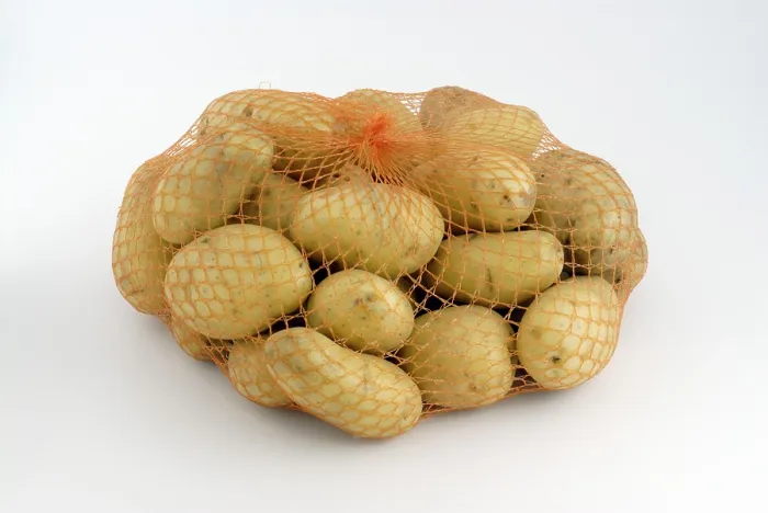 Framed Print : Potatoes in a Net Print Framed Print : Potatoes in a Net Print