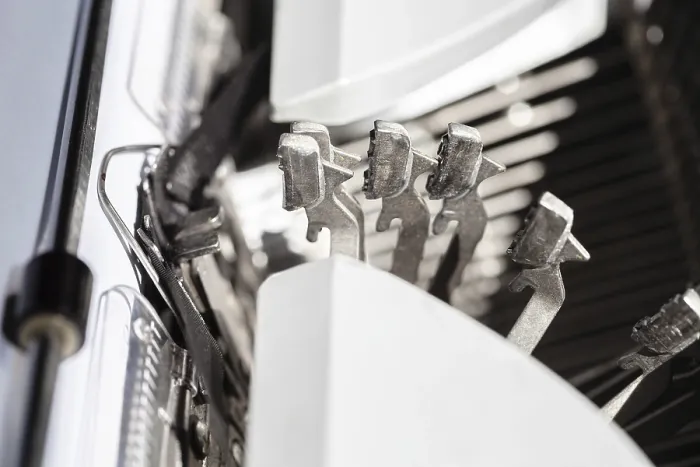 Framed Print : Old Typewriter Print Mechanism: Multiple Type Bars in Action Framed Print : Old Typewriter Print Mechanism: Multiple Type Bars in Action
