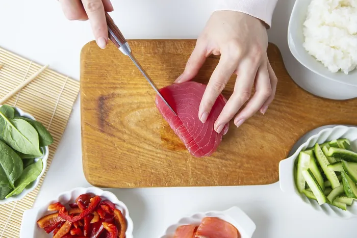Framed Print : In the Process of Making Sushi Print: Preparing Tuna
