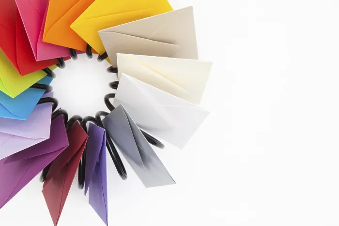 Framed Print : Propeller of Colored Envelopes Print on White Table Framed Print : Propeller of Colored Envelopes Print on White Table