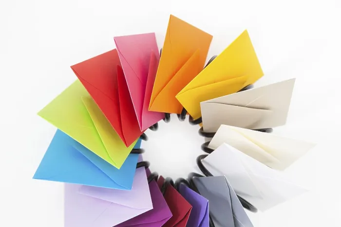 Framed Print : Propeller of Colored Envelopes Print on White Table Framed Print : Propeller of Colored Envelopes Print on White Table