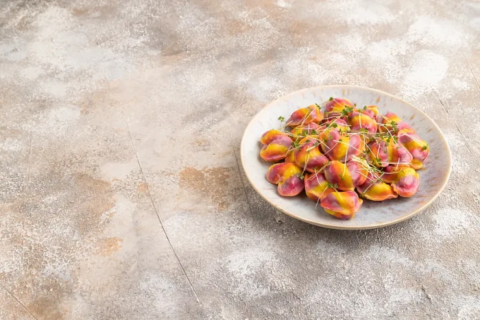 Framed Print : Rainbow Colored Dumplings Print on Brown Concrete Background Framed Print : Rainbow Colored Dumplings Print on Brown Concrete Background