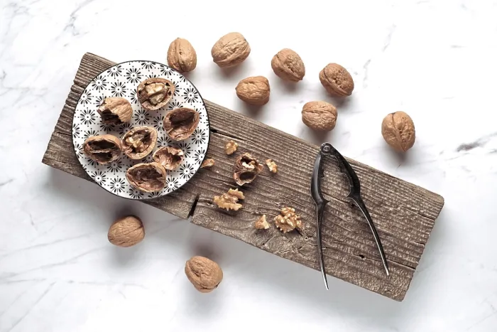 Framed Print : Walnuts on a Patterned Plate Print Framed Print : Walnuts on a Patterned Plate Print