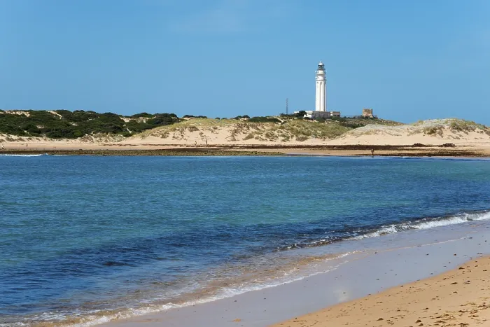Framed Print : Sandy Beach Print with Lighthouse at Cape Trafalgar, Spain