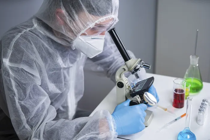 Framed Print : Scientist Examining Sample with Microscope Print Framed Print : Scientist Examining Sample with Microscope Print