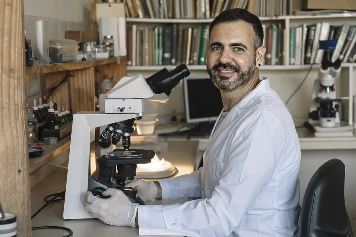 Framed Print : Scientist in Front of Microscope Print Framed Print : Scientist in Front of Microscope Print