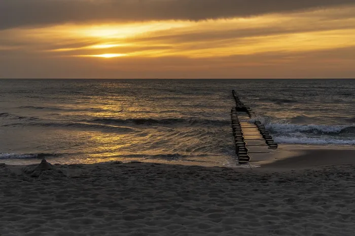 Framed Print : The Setting Sun at the Beach in Ahrenshoop Print