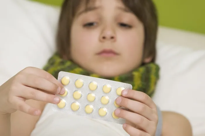Framed Print : Sick Boy Taking Tablets Print Framed Print : Sick Boy Taking Tablets Print
