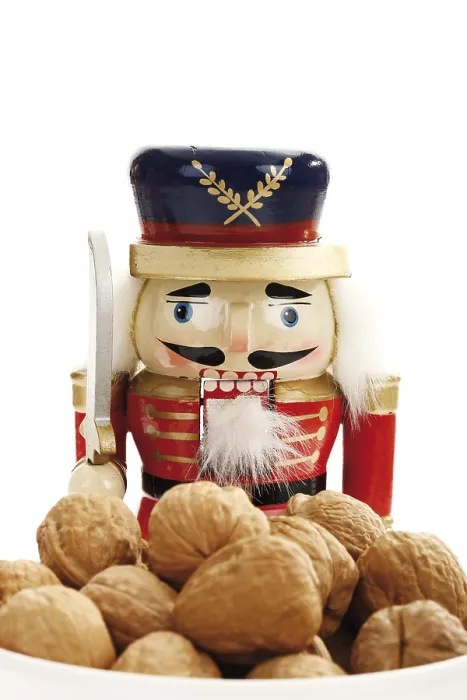 Framed Print : Small Bowl of Walnuts Print with Nutcracker Figure