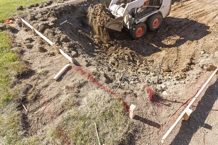 Framed Print : Small Bulldozer Digging in Yard for Pool Installation Print Framed Print : Small Bulldozer Digging in Yard for Pool Installation Print