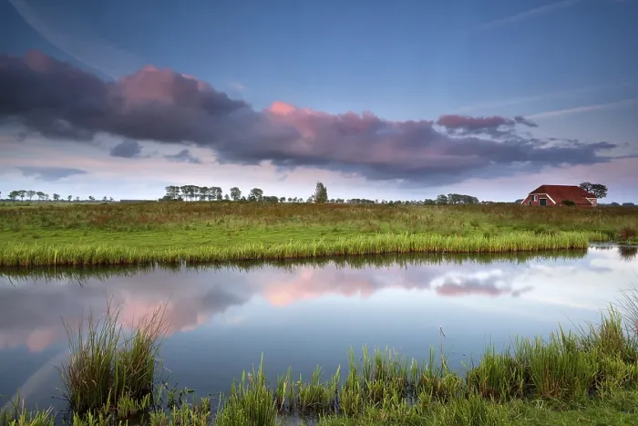 Framed Print : Small House by River at Dramatic Pink Sunset Print Framed Print : Small House by River at Dramatic Pink Sunset Print
