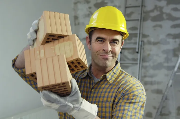 Framed Print : Smiling Workman Holding Bricks Print Framed Print : Smiling Workman Holding Bricks Print