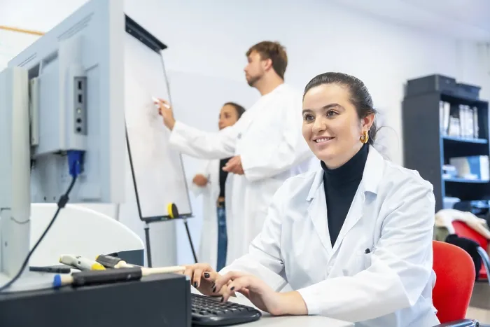 Framed Print : Smiling Young Scientist Print - Laboratory Office Scene Framed Print : Smiling Young Scientist Print - Laboratory Office Scene